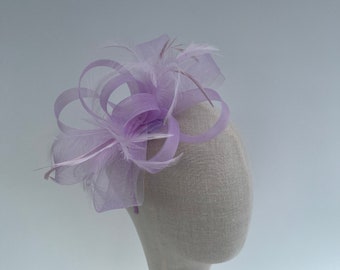 Lilac purple headband and clip mesh bow shape fascinator with added feathers