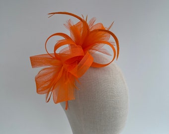 New bright orange headband and clip mesh bow shape fascinator with added feathers