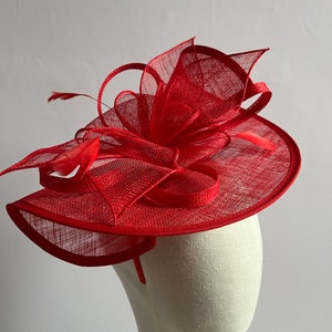 New red fascinator headband and clip fascinator made from sinamay with feathers
