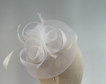 New white headband and clip rounded mesh fascinator with mesh loops and flowers and added feathers