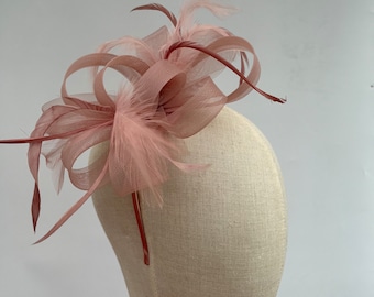 New blush pink headband and clip mesh bow shape fascinator with added feathers