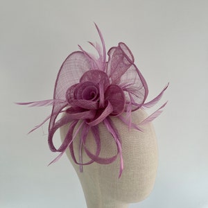 Purple sinamay twisted base with flower headband and clip fascinator