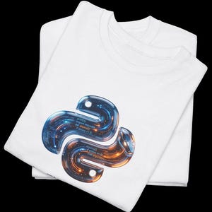 May include: White t-shirt featuring a stylized Python logo in blue and orange with embedded code snippets. The logo is a glossy, three-dimensional design. The shirt is folded, showing the front of the shirt with the logo.
