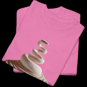 Azalea pink t-shirt with a graceful, artistic Python Zen emblem. Empowering and unique graduation gift for female data analysts and computer science students Class of 2026.