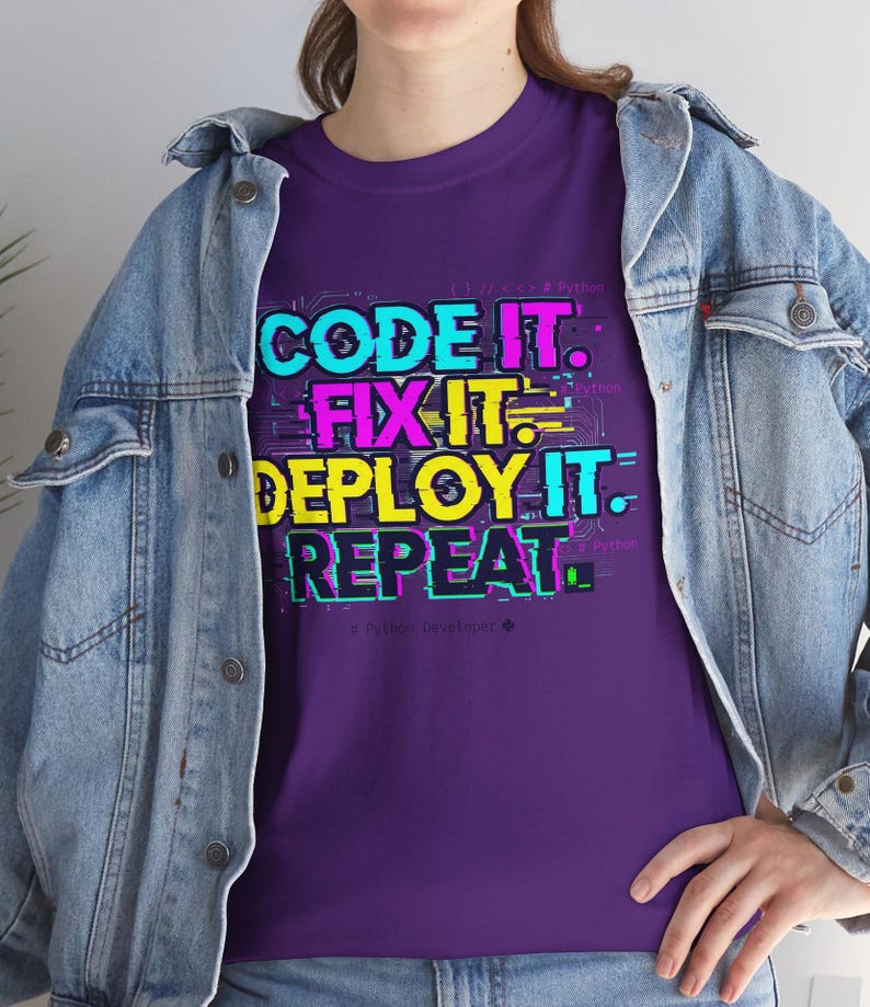 Purple shirt with a bright professional glitch print. A funny and stylish gift for software developers and tech leads. Features a bold repeat cycle coding mantra.