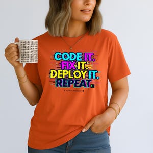 Orange shirt with a bright professional glitch print. A funny and stylish gift for software developers and tech leads. Features a bold repeat cycle coding mantra.