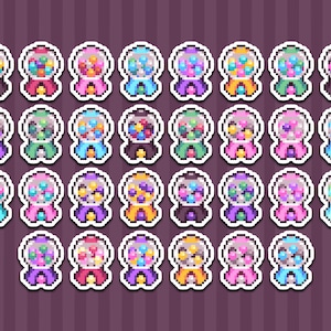 Può includere: Un set di 25 macchinette per chewing gum in pixel art colorate con chewing gum di diversi colori all'interno. Ogni macchinetta ha una base di colore diverso e un manico di colore diverso.