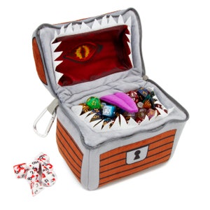 CASEMATIX Mimic Dice Chest and Dice Jail with 7 Included RPG Dice - 6.5" Plush Mimic Chest Dice Bag with Zipper and Carabiner for 150 Dice