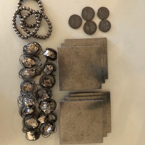 Shungite necklaces, bracelets, plates, and phone charms
