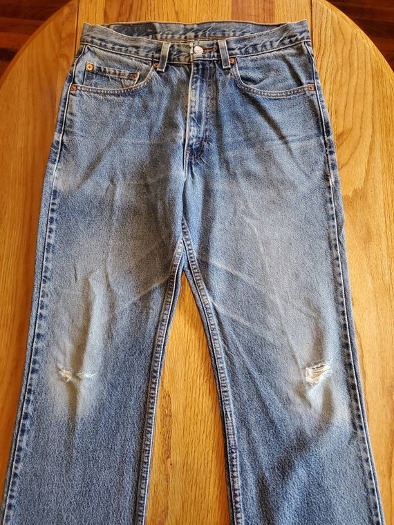 Vintage Levi's 517 Faded and Distressed Jeans Size