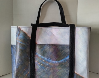 One-of-a-kind tote from banners. Color matters! Have a beautiful day with this tote.