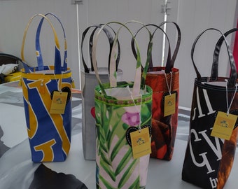 Pamper your Pinot Noir!  Unique Wine Tote bags made from Vinyl Banners or Billboards.  Each one a cheerful design by Chris M.