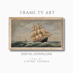 May include: A framed painting of a ship sailing on a choppy sea. The ship has white sails and is surrounded by blue water and white clouds. The painting is in a light wood frame.