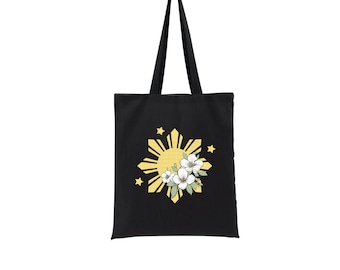 Philippines sun and stars featuring the Philippines flower Sampaguita tote