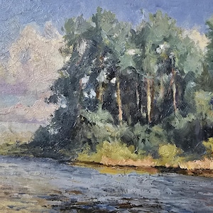 May include: Oil painting of a landscape featuring a river, trees, and a small building. The sky is a mix of blue and white, with hints of pink. The trees are green, and the building has a red roof. The painting has a textured, impressionistic style.