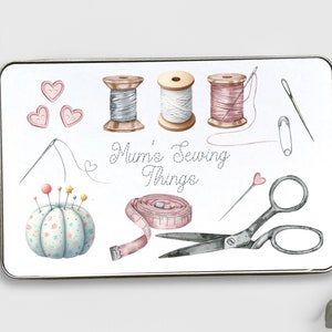 May include: A white background with a collection of sewing supplies, including spools of thread, needles, a pincushion, scissors, and a tape measure. The text "Mum's Sewing Things" is written in a cursive font.