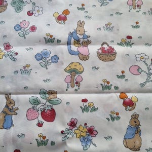 Piece of cotton fabric printed with rabbit Fabric for sewing patchwork creation