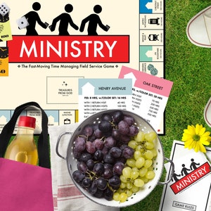 May include: A board game called "Ministry" with a red banner. The game includes a dice, cards, and a game board. A colander of grapes, a bottle of juice, and a pink tote bag are also present. The game is set on a green grassy surface.