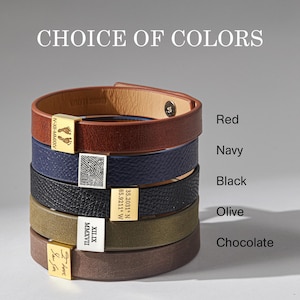 May include: Leather bracelets in red, navy, black, olive, and chocolate. Each bracelet has a metal clasp with unique engravings, including footprints, a fingerprint, coordinates, and Roman numerals. The text "CHOICE OF COLORS" is at the top.