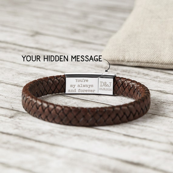 A leather bracelet with a hidden engraved message rolled inside — the secret only the wearer knows about is a genuinely clever twist on personalized jewelry.