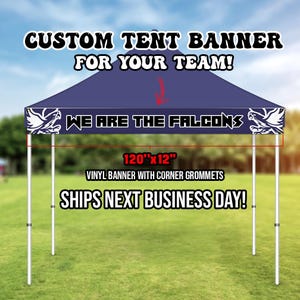 May include: A blue tent with a white banner that reads "WE ARE THE FALCONS". The banner is 120 inches by 12 inches and is made of vinyl with corner grommets. The tent is set up on a grassy field.