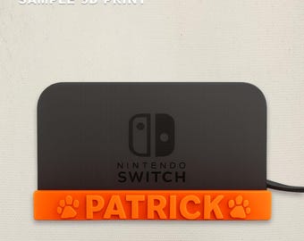 Nombre y logotipo personalizados en la base de Switch 2: organizador de escritorio para juegos personalizado