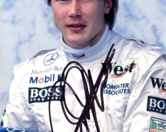 フィンランドの元レーシングF1ドライバー、ミカ・ハッキネンの直筆