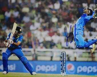 M.S. Dhoni autograph photo –  ICC Cricket World cup moment