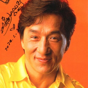 Hand Signed very rare autograph signature of Holywood actor Jackie Chan on classic photo