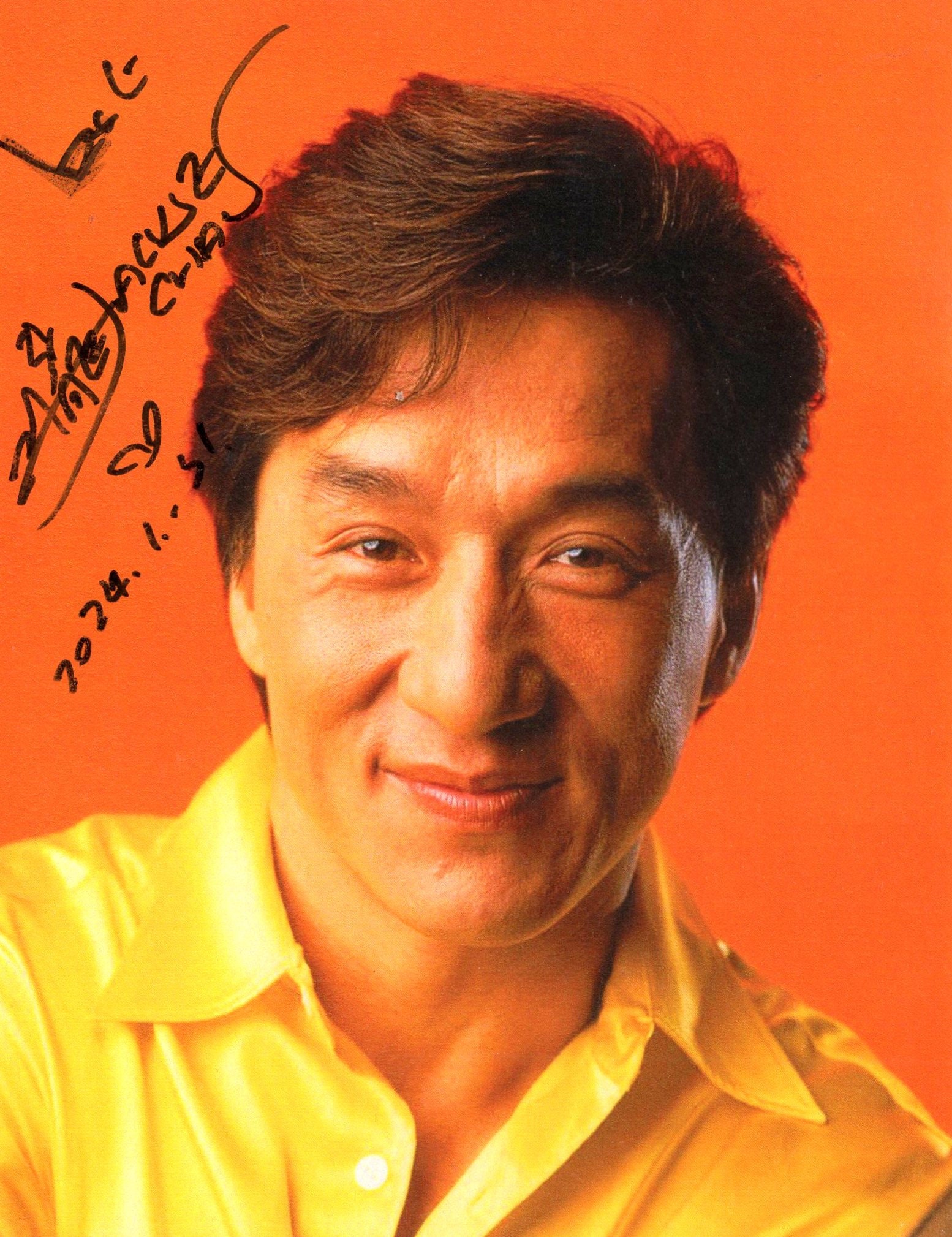 ハリウッド俳優ジャッキー・チェンのクラシック写真に直筆サインされた