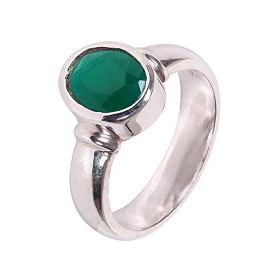 Green stone ring best sale astrology