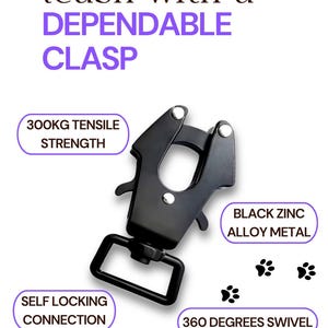 May include: A black zinc alloy metal frog clip for leashes featuring a self-locking connection, 360 degrees swivel, and 300kg tensile strength. The text reads: FROG CLIP, Upgrade your leash with a DEPENDABLE CLASP, 300KG TENSILE STRENGTH, BLACK ZINC ALLOY METAL, SELF LOCKING CONNECTION, 360 DEGREES SWIVEL, DOG WALKING MADE EASIER.