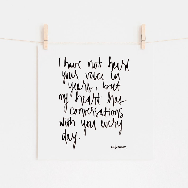 May include: Black and white handwritten quote on a white background. The quote reads: "I have not heard your voice in years, but my heart has conversations with you every day." The quote is attributed to "poufs wayin".