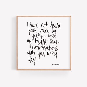 May include: Black and white typography print with the quote "I have not heard your voice in years, but my heart has conversations with you every day." The quote is attributed to "poufs wan".