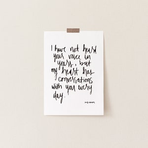 May include: A black and white print with the text "I have not heard your voice in years, but my heart has conversations with you every day."