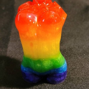 Rainbow stripped torso statue