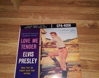 Vintage music from Elvis' movie Love Me Tender on 45's. There's a hard sleeve and soft sleeve. Included is another vintage 45 of four songs