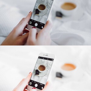 K&ouml;nnte beinhalten: Ein wei&szlig;es Smartphone mit einem schwarzen Bildschirm, auf dem ein Foto von einer Tasse Kaffee und einer kleinen Schokoladentafel auf einer wei&szlig;en Oberfl&auml;che zu sehen ist. Das Telefon wird von den H&auml;nden einer Person gehalten.