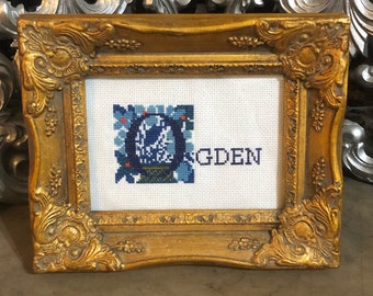 Custom name cross stitch with decorative letter