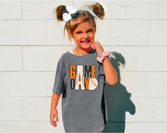 Camiseta de béisbol naranja y blanca para el día del partido