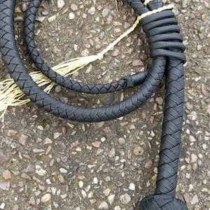 Paracord Pocket Whip 30 inch Snake Whip in black, shot loaded core and fully waxed