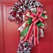 Lori Worthing reviewed Christmas Candy Cane front door deco mesh loop Wreath Merry Christmas Holiday Xmas Seasonal peppermint DIY Porch Decor by SpaceCoastCrafts23