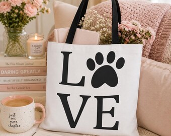 Hundälskare, present, husdjursägare, tassavtryck, djurtygväska, shopping, vardagsbär, hjärtdesign, svartvit, grafisk väska, valpmamma, hundfan, promenader
