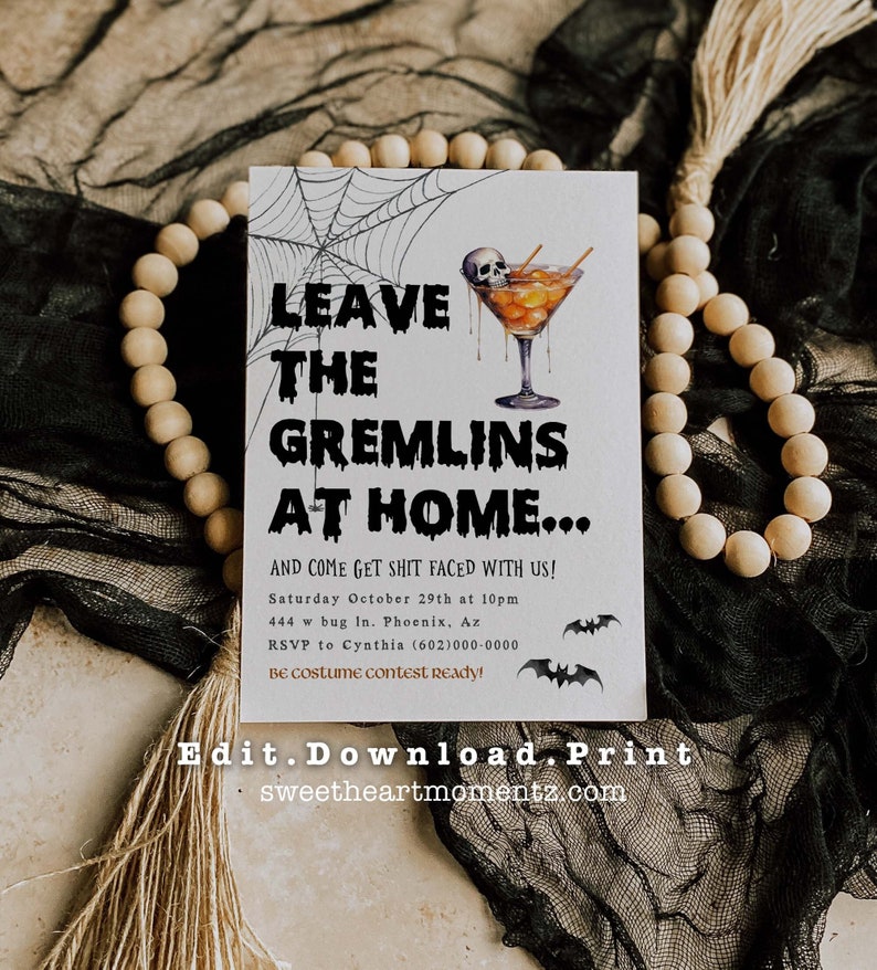 May include: Halloween-themed invitation with the text "LEAVE THE GREMLINS AT HOME..." and a cocktail illustration. Includes event details: date, time, location, and RSVP information. The invitation also has a spiderweb and bat graphics.