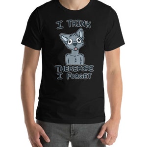 Puede incluir: Una camiseta negra con un lobo de dibujos animados y el texto "Pienso, luego olvido".