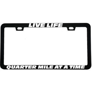 May include: A rectangular black number plate surround featuring white text. The top section displays the words LIVE LIFE, while the bottom section features the phrase QUARTER MILE AT A TIME. The frame includes two mounting holes at the top.