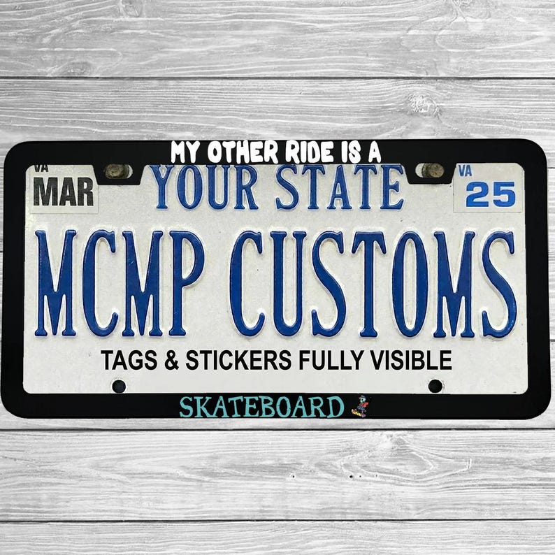 "My Other Ride Is A Skateboard" license plate frame shown on vehicle — lifestyle photo