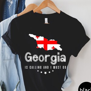 Georgia Is Calling And I Must Go Shirt, Georgia Shirt, Georgia Trip Shirt, Travel Lover Gift, Georgia Vacation Shirt, Unisex Tee