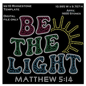 May include: A rhinestone design template for a t-shirt or other apparel. The design features the words "Be the Light" in a colorful, retro font with a sun graphic. The text "Matthew 5:14" is also included in the design.