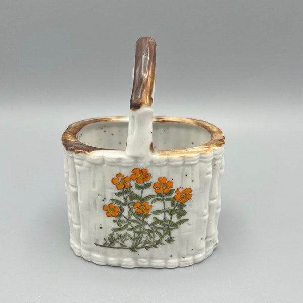 Small Counterpoint Ceramic Basket Planter with Orange Flowers